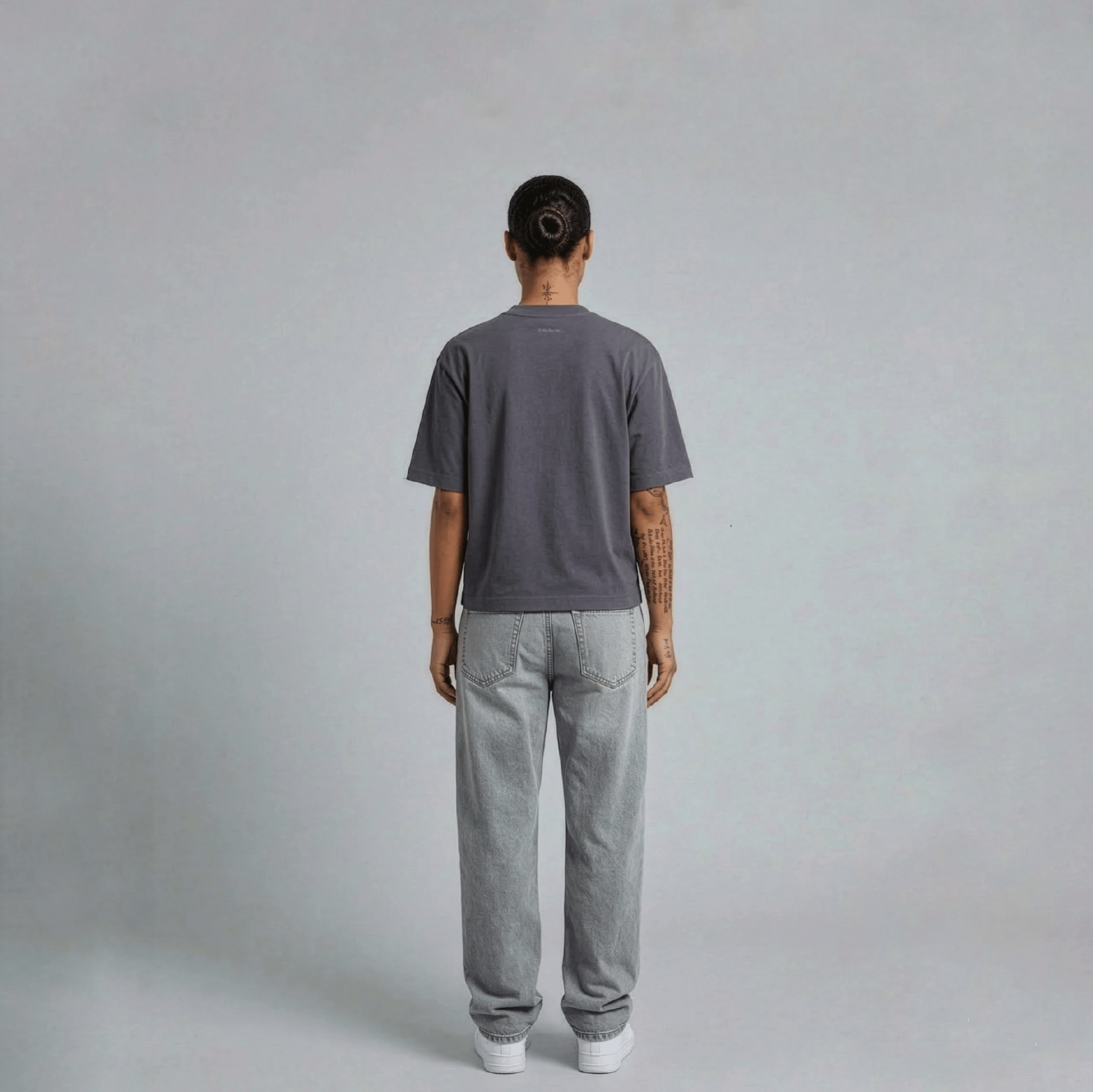 THBC Basic Tee in Stone, model wearing size M, rear view